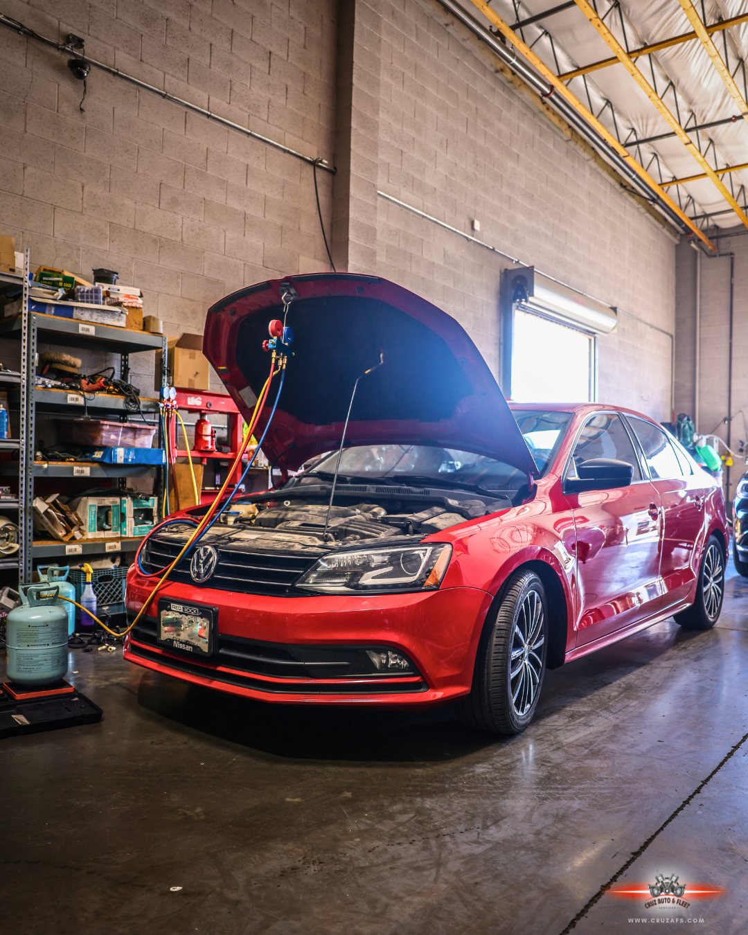A car under work in a service bay
