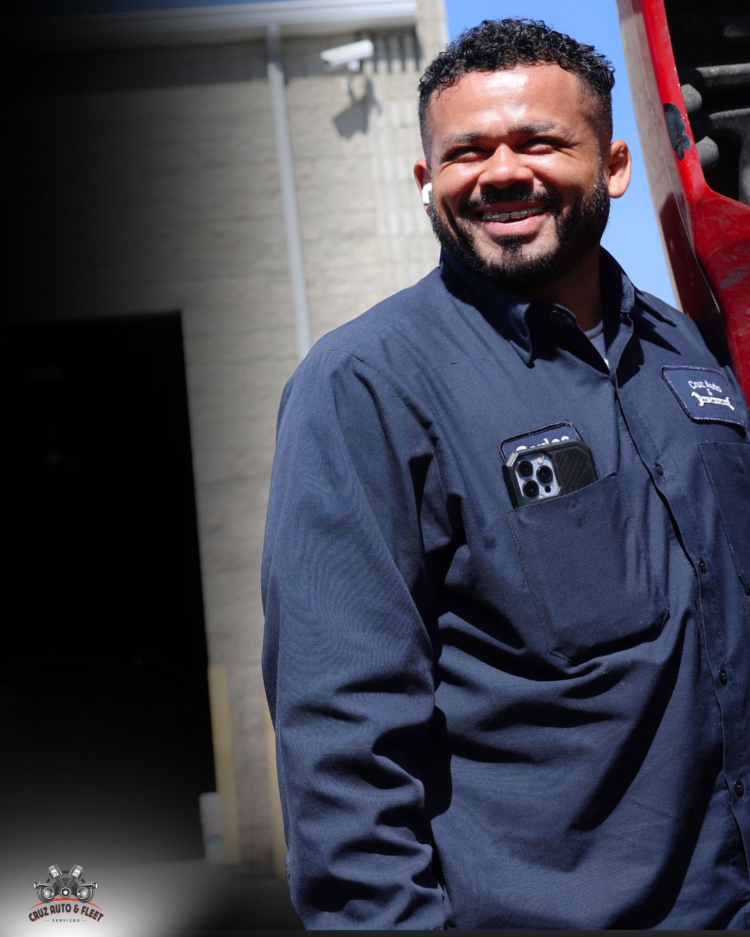 A technician in workwear at a service centre
